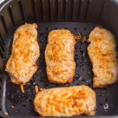 Thumbnail for Parmesan-coated pork chops in the air fryer.